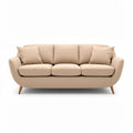 **Moderne beige bank met kussens en houten poten**